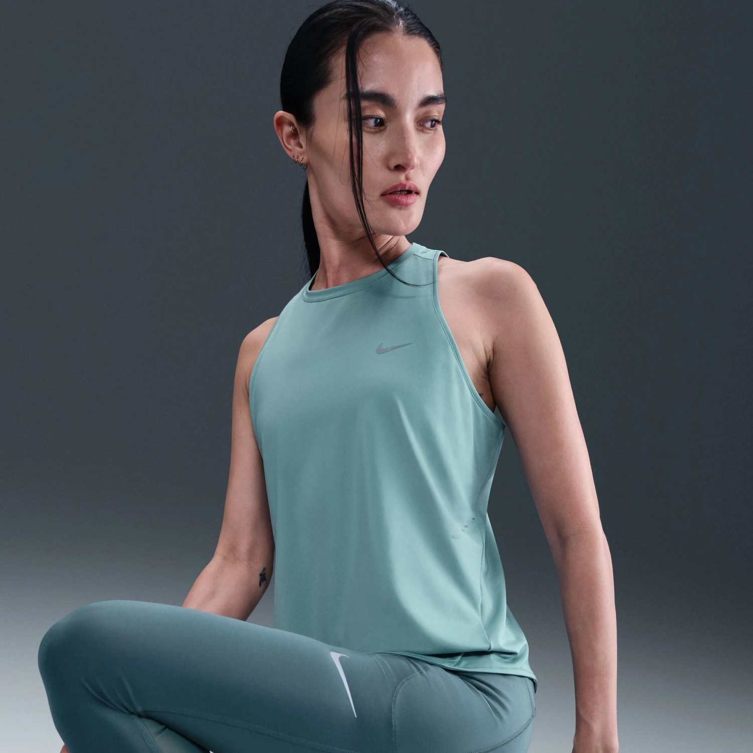 Nike Women's Swift Dri-FIT Running Tank Top (017 - Cannon/Reflective Silver) 8 Nike Women's Swift Dri-FIT Running Tank Top (017 - Cannon/Reflective Silver) - Image 6